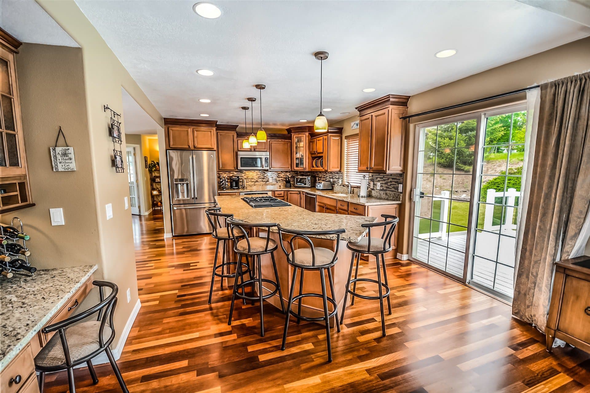 4. Wood Cabinets with Hardwood Floors