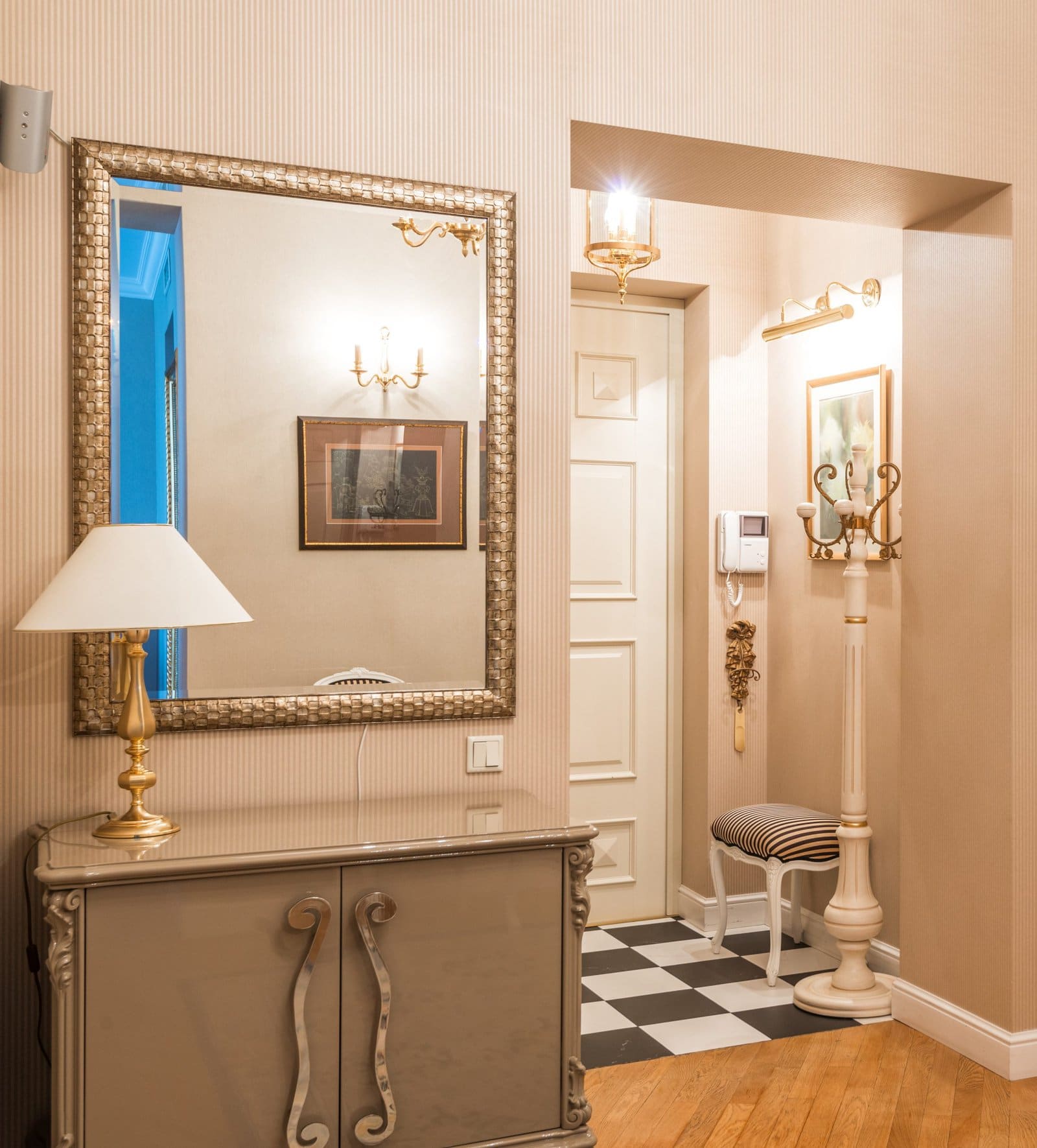  A Large Gold Framed Mirror Looks Fabulous in a Parisian Bedroom scaled