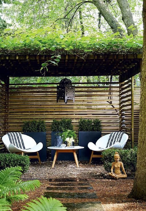 Zen garden features a pergola