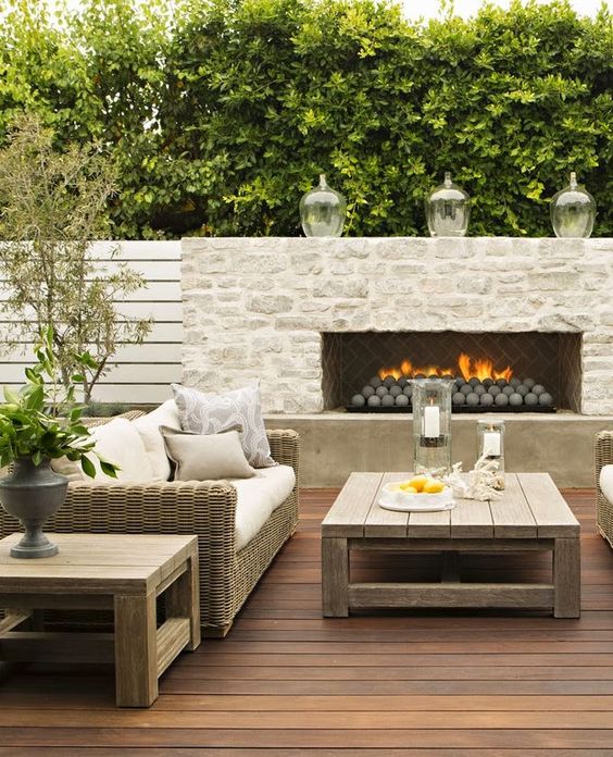 light colored brick on fireplace and natural wood tones 