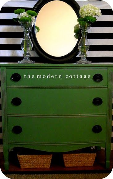 green dresser with dark hardware