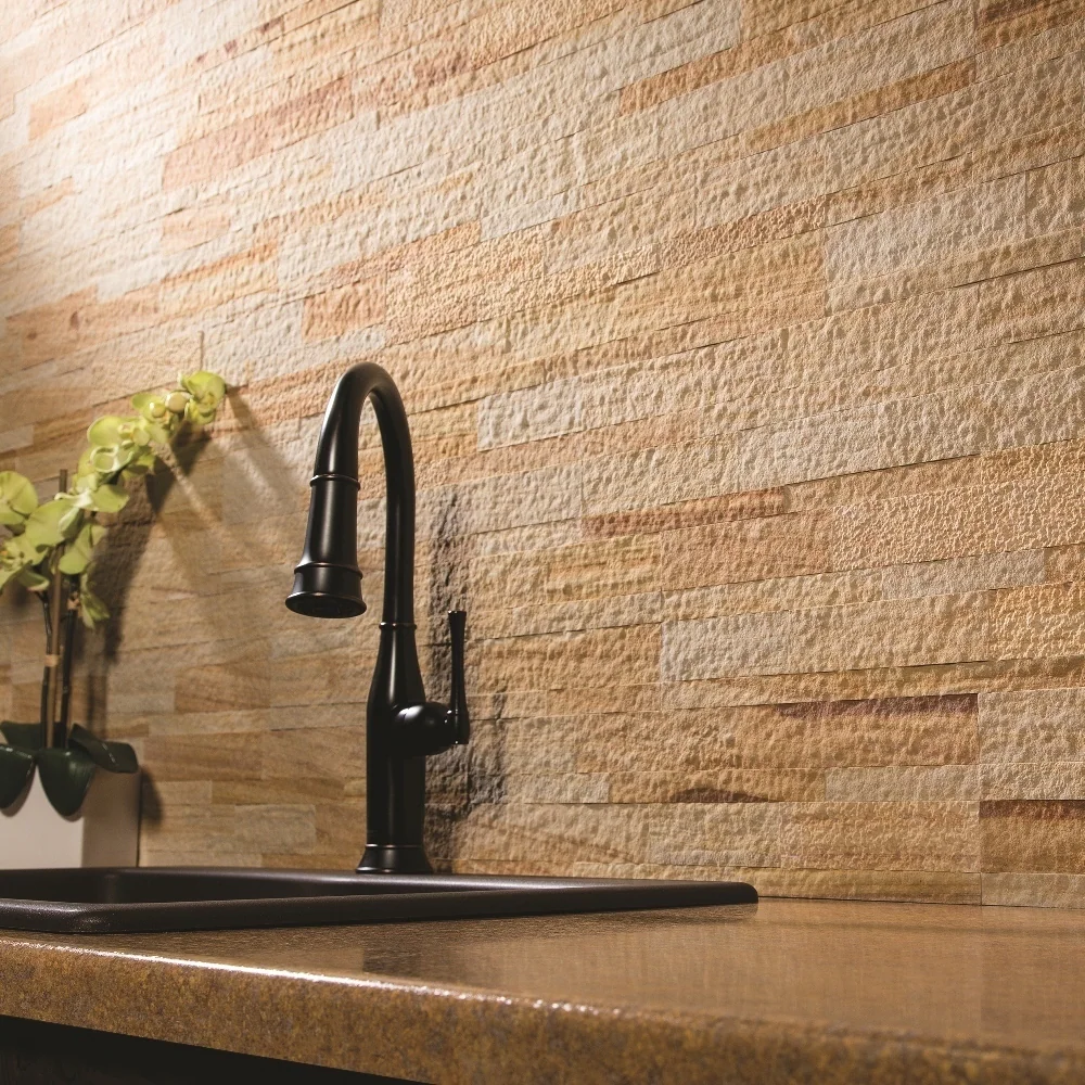 Enjoy the Glow of a Golden Sandstone Brick Backsplash